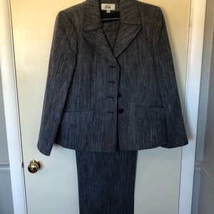 Two piece suit, new. Pants has tag, jacket doesn’t